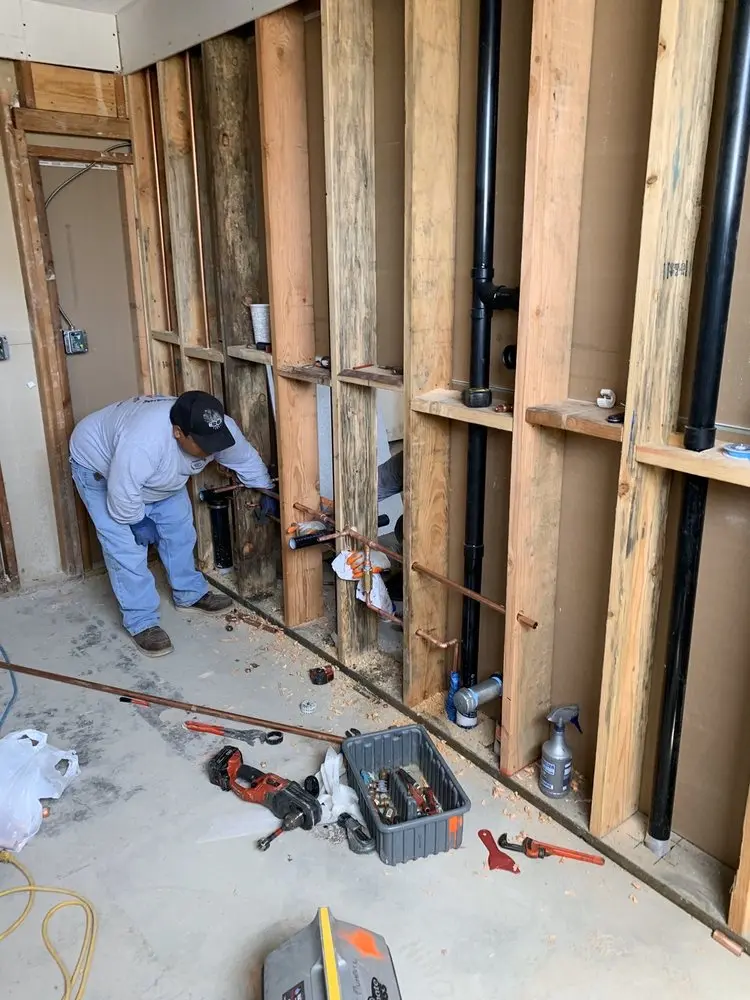 Commercial rough-in plumbing for Water Heater Replacement in Forest Dale
